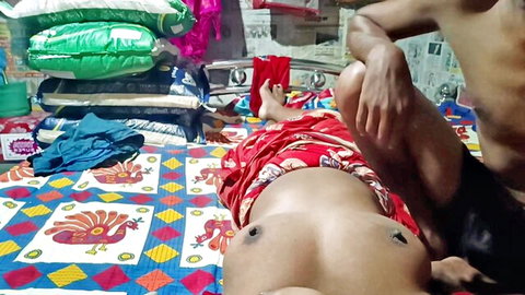 Indian Bhabhi topless in red saree giving hot rubdown to young stud