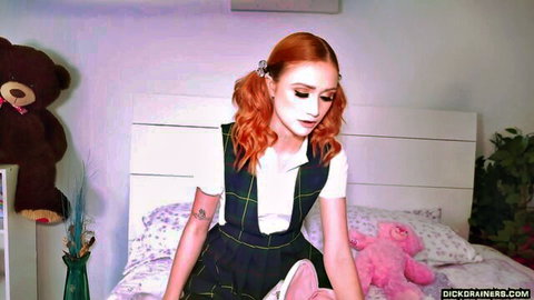 Scarlet Skies redhead in sexy schoolgirl uniform on bed, pigtails tease