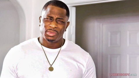 Confused handsome black stud in white t-shirt stands in doorway ready for BBC action