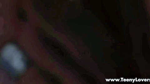 Blurry dark promotional image featuring repeated TeenLovers watermarks for teen porn site