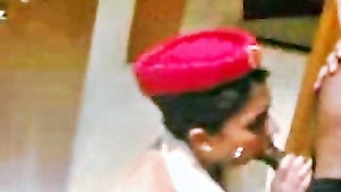 Waitress in red beret hat eagerly sucks customer's hard cock closeup
