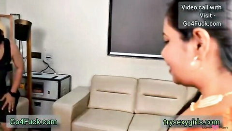 Smiling Indian wife in black top groped by boyfriend on couch during steamy video call