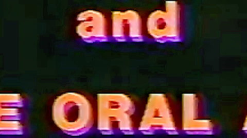 Retro glowing 'AND ORAL' text title screen for vintage porn video.