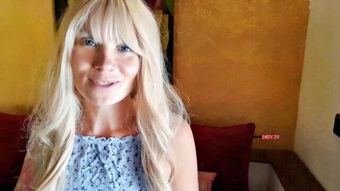 Blonde bombshell Lea Stern smiles in frilly blue top, teasing POV preview