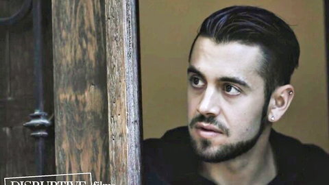 Dante Colle in black hoodie, intense gaze in stepbrother gay scene with Carter Woods