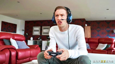 Intense gamer dude in white sweater with headphones, Brazzers scene