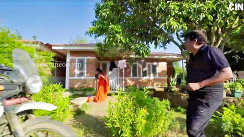 Indian aunty in orange saree seduced by man outdoors near village home