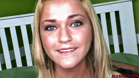 McKenzee Miles smiling blonde in green top, seductive bedroom tease