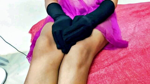 Lailavideos in sheer pink dress and long black gloves, seductive sitting pose