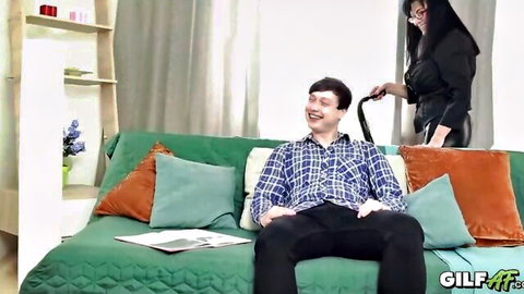 Busty 67yo Asian granny in black dress teases young neighbor boy with vacuum handle
