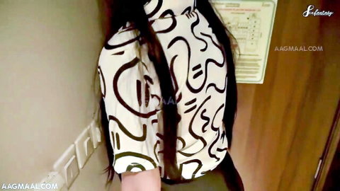 Asian teen in abstract white top, long black hair, from behind teasing tight ass