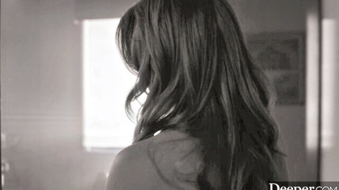Octavia Red sexy back view with long wavy hair, erotic black and white pose
