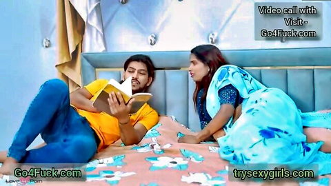 Sexy Indian bhabhi in blue saree seducing dewar on bed