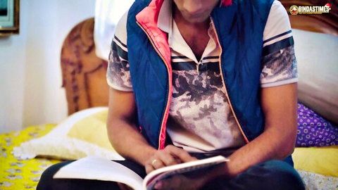 Mature Indian man in vest reading book, stepmom lesson preview