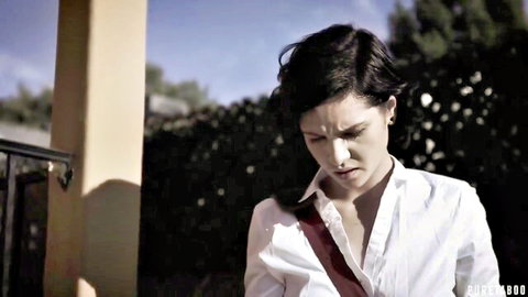 Melissa Moore in white shirt, pensive outdoor pose, softcore tease