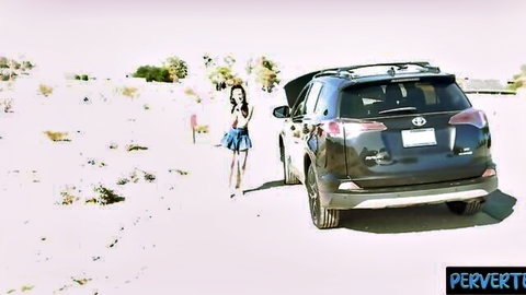 Aubree Valentine in short blue skirt by stranded SUV in desert