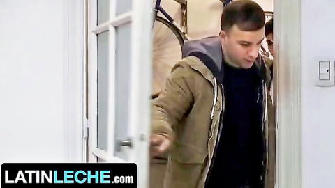 Handsome young Latino guy in puffer jacket opening door in gay porn teaser