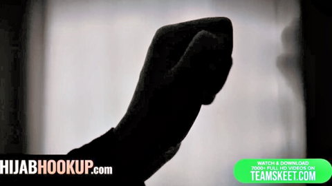 Gloved hand raised in promo for Hijab Hookup Arab Muslim porn site