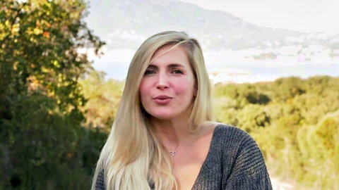 Blonde Chloe 29 outdoors in gray sweater, smiling seductively