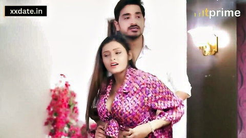 Passionate Indian couple embracing intimately in homemade scene