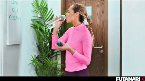 Tanned brunette in tight pink top drinks water teasing small tits and skinny body
