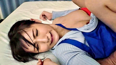 Japanese housekeeper in open uniform exposing breasts on bed, erotic JAV thumbnail