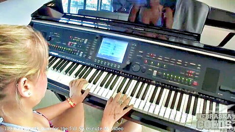 Blonde college sorority girl playing piano nude beach house