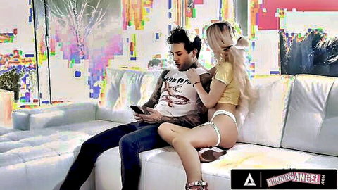 Blonde teen Kenzie Reeves in white lingerie sits on tattooed guy's lap seductively