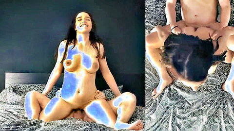Skinny long-haired brunette spreads legs as guy eats her glowing blue-highlighted pussy and tits on bed
