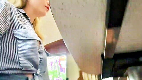 Blonde woman in striped shirt inside motorhome, teasing for stranger anal