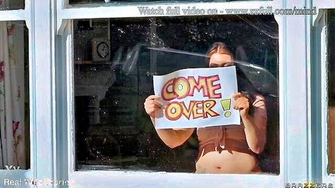 Jasmine Brooks teasing from window with 'Come Over!' sign, Brazzers