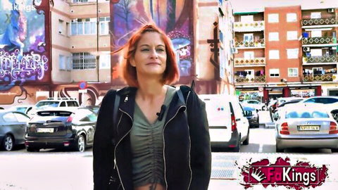 Albaan, sexy redhead Latina posing on urban street