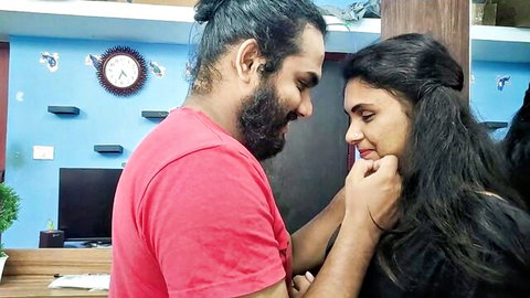 Intimate close-up of bearded Indian man kissing hot Malayali maid's face