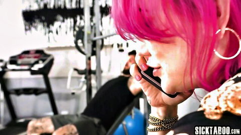 Lena Moon pink-haired shemale gym rat on phone in sexy black outfit