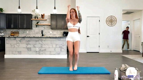 Sophia Locke in white lingerie stretching on mat with stepson Juan Loco watching