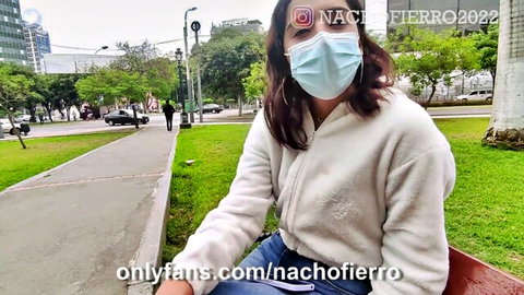 Masked Latina beauty in hoodie on park bench, Nacho Fierro OnlyFans teaser