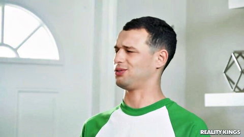 Stepbrother in green jersey grimacing in pleasure, Maya Farrell & Cherie DeVille scene