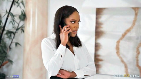 Ebony office babe in white blouse talking on phone with cleavage tease