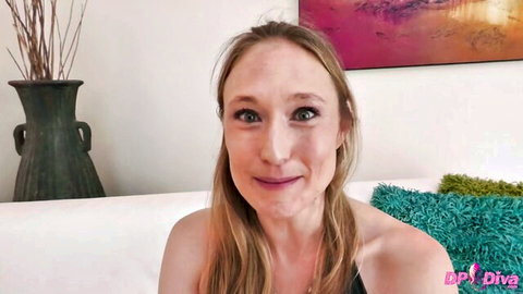 Ophelia Kaan smiling with cleavage in DP Diva MILF thumbnail