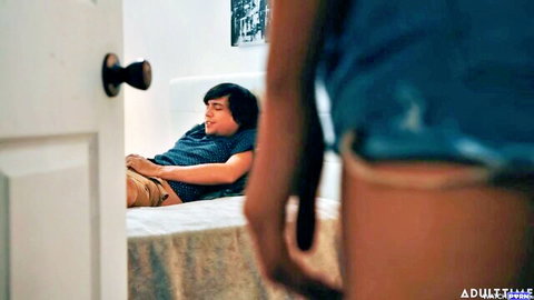 Curvy MILF in tight shorts sneaks up on sleeping stepson lying on bed