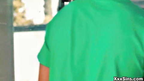 Liz Jordan in green top from behind with Rocket Powers in naughty car scene