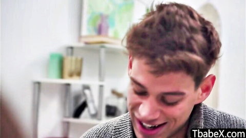 Aria Lee smiling in gray sweater, teasing shemale deepthroat scene