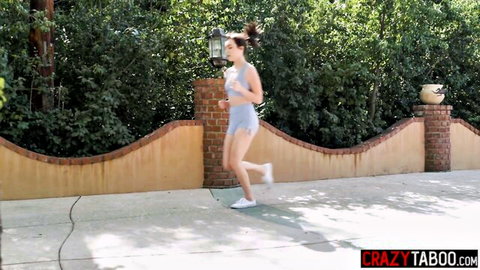 Tanned skinny teen jogging in tight blue sports bra and shorts flaunting perky tits and firm ass