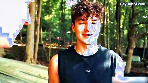 Theo Brady smiling in forest, curly hair twink ready for outdoor fun