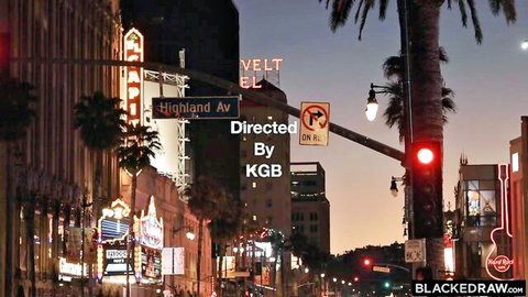 Dakota Lyn MILF in neon-lit Hollywood street scene at night