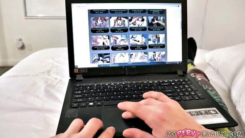 Hands browsing explicit hentai porn thumbnails of anime teens in rough sex on laptop screen