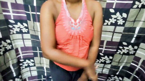 Sexy Indian babe in tight halter top squeezing tits together with arms crossed