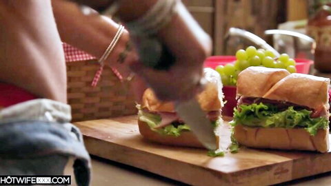 Skinny fair-skinned wife in red thong exposes average ass pulling down jeans while cutting sandwiches
