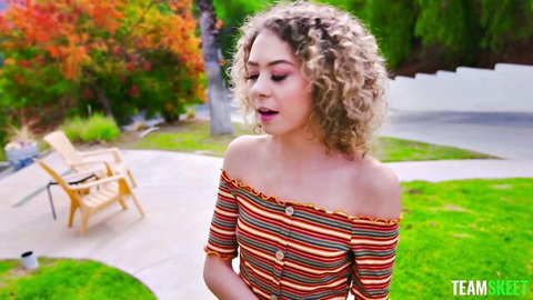 Allie Addison in striped off-shoulder top, seductive outdoor tease