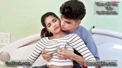 Hot Indian couple intimately embracing and kissing on bed